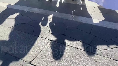 Scene from Ucraina, in piazza Duomo a Milano pupazzi e scarpe simbolo dei bambini ucraini