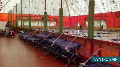 Scene from Coronavirus, centro sportivo Saini di Milano ricovero per senzatetto