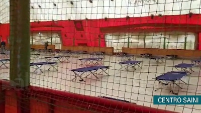 Scene from Coronavirus, centro sportivo Saini di Milano ricovero per senzatetto