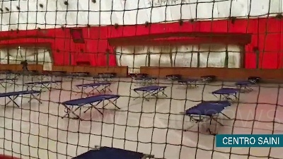 Scene from Coronavirus, centro sportivo Saini di Milano ricovero per senzatetto