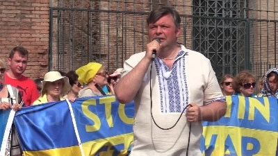 Scene from Putin con falce e mani insanguinate: flashmob ucraini a Roma