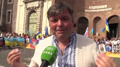 Scene from Putin con falce e mani insanguinate: flashmob ucraini a Roma