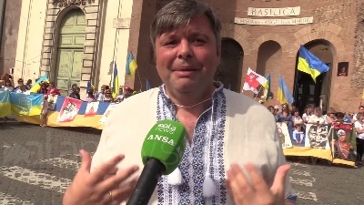 Scene from Putin con falce e mani insanguinate: flashmob ucraini a Roma