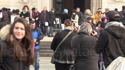 Scene from ARCHIVIO - Dicembre 2018, Milano: Duomo + persone di colore + Inter store