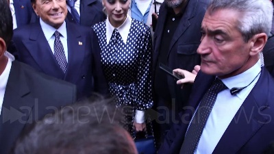 Scene from Elezioni, Berlusconi al voto a Milano insieme alla compagna Marta Fascina