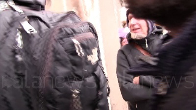 Scene from Milano, giornalista di La7 aggredito durante la manifestazione No Paura Day