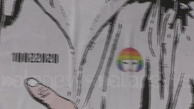 Scene from Il murales di Regeni che abbraccia Zaki a due passi dal consolato egiziano