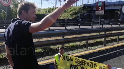 Scene from Ambientalisti bloccano la Tangenziale est a Milano, tensione con gli automobilisti