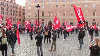 Scene from Il Partito Comunista è sceso in piazza per manifestare contro il governo Draghi