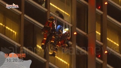 Scene from Hong Kong, scala un grattacielo in sedia a rotelle